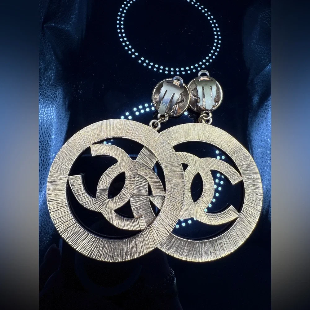 LOT 1690 24K gold plated CHANEL vintage sunburst Rihanna’s clip on earrings